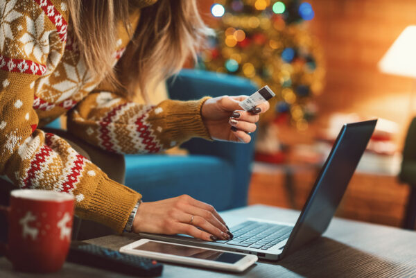 Woman doing online shopping at Christmas0000000